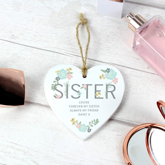 Personalised Sister Floral Wooden Hanging Heart Decoration From Pukkagifts.uk